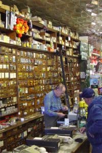 The walls are lined with storage drawers in Nicholes Hardware Store Purcellville VA